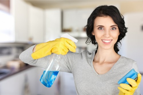 Cleaner maintaining a communal hallway and staircase