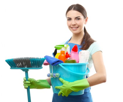 Domestic cleaner tidying a kitchen in Hounslow
